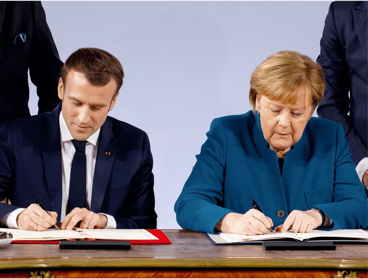 Photographie d'Emmanuel Macron et Angela Merkel lors de la signature du traité d'Aix-la-Chapelle