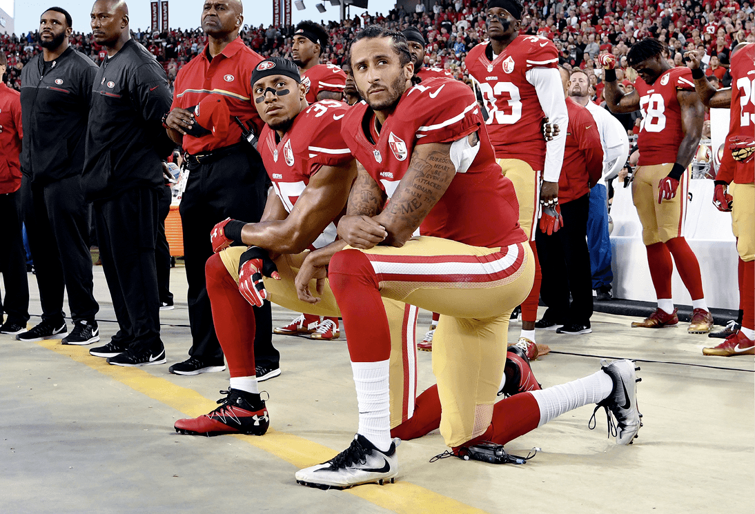 Eric Reid and Colin Kaepernick kneeling during the national anthem, 2016