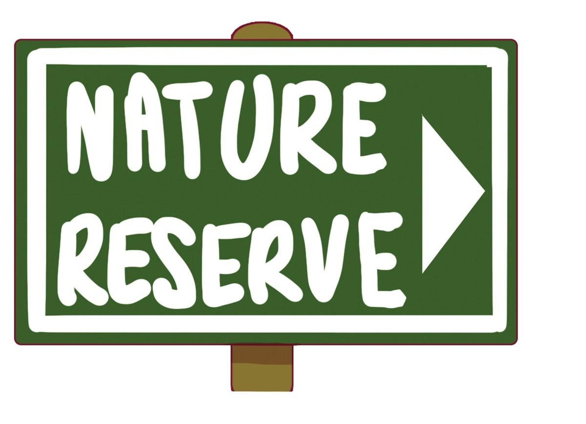 Une flèche de direction vers la réserve de nature