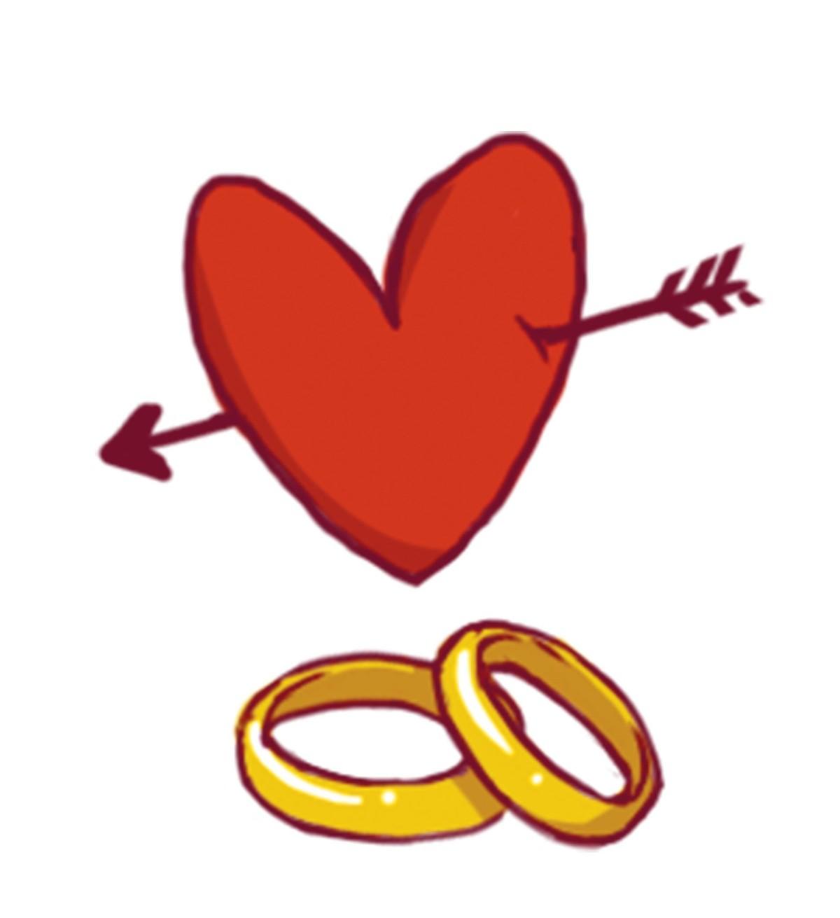 A red heart with two gold rings